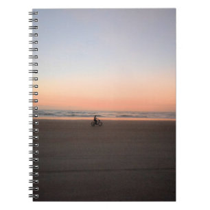 Radtour am Morgen auf dem StrandNotebook Notizblock