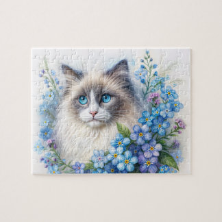 Ragdoll-Katze unter Vergissmeinnicht-Blumen