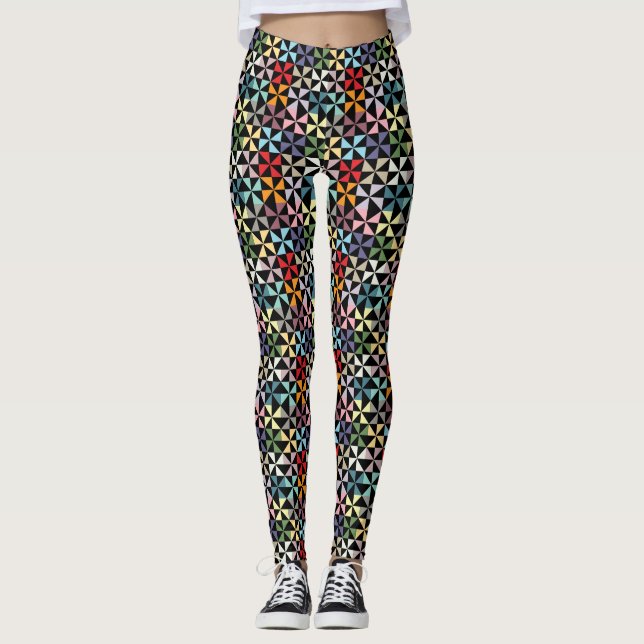 Rainbow Geometric Pinwheel Muster auf schwarz Leggings (Vorderseite)