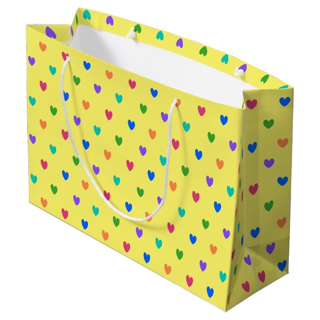 Rainbow-Polka-Herzen auf Gelb Große Geschenktüte (Rückseite Schrägansicht)