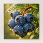 Raindrops on Ripe Blueberries<br><div class="desc">Ripe blueberries hang from a branch,  adorned with dewdrops,  while the sunlight casts a warm glow around their vibrant blue hue</div>
