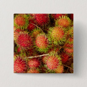 Rambutan-Frucht auf dem Can Duoc Markt Button