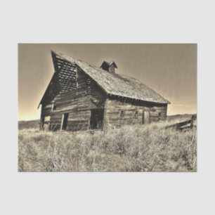 Ramshackle Sepia Barn in einem desolaten Grasfeld Seidenpapier