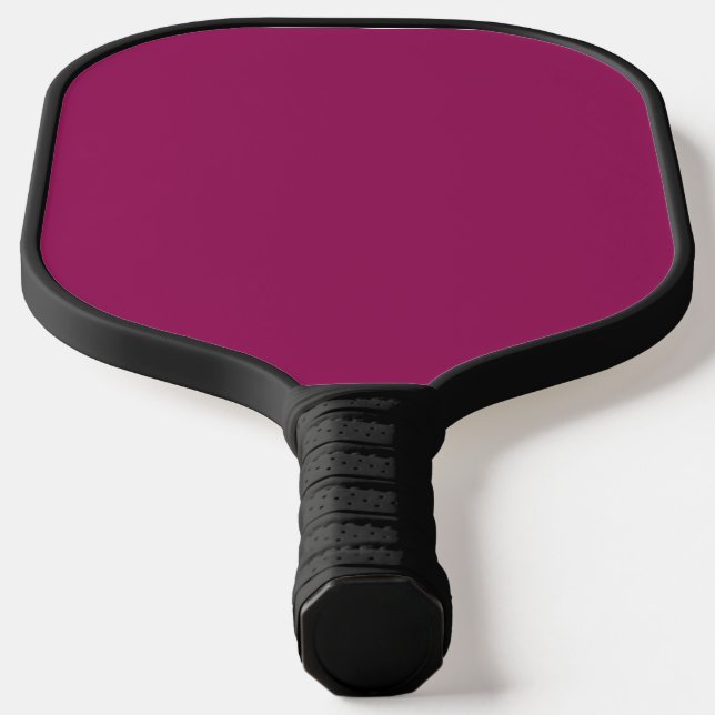 Raquette De Pickleball un arrière - plan rose avec une bordure blanche (Poser)