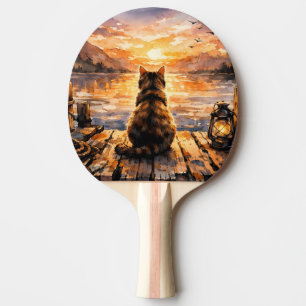 Raquette De Ping Pong Chat sur le quai au coucher du soleil