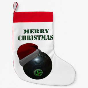 Rasenschale mit einer Weihnachtsmannmütze, Kleiner Weihnachtsstrumpf