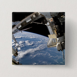 Raumfähre Atlantis und ein Soyuz Raumfahrzeug Button