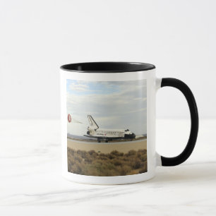 Raumfähre-Entdeckung entfaltet seine Tasse