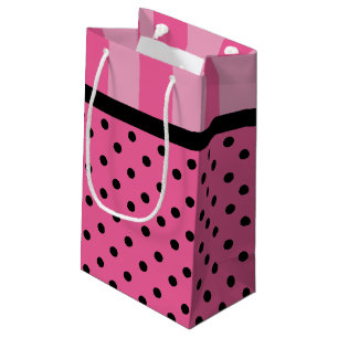 Rayures d'amour et sacs roses de cadeau de partie