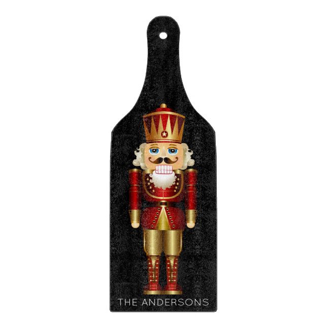 Red and Gold Nutcracker auf Black Schneidebrett (Vorderseite)