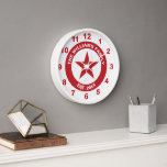 Red and White Star Retro Advertising Style Uhr<br><div class="desc">This clock in red and white was inspired by vintage gasoline advertising designs. It has a red star shape at the center that can be personalized with an initial, and a red ring that can be personalized with your family name and your "established" date or any custom text you choose....</div>