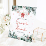 Red Christmas Santa Baby Showstar Gästebuchsignatu Sockelschild<br><div class="desc">Das Red Santa Gender Neutral Santa Baby Kleidung Christmas Baby Guest Book Sign fügt Ihrer Babydusche eine reizvolle, festliche Touch hinzu. Dieses Schild mit zarten Schneeflocken, Eukalyptusgrün und bezaubernden, vom Weihnachtsmann inspiriert Baby-Kleidung lädt die Gäste herzlich ein, ihre herzlichen Botschaften und Unterschriften im Gästebuch verlassen. Es ist eine charmante Art,...</div>