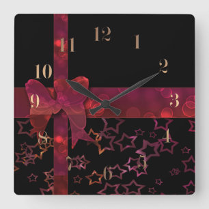 Red glitter bow and stars on black quadratische wanduhr