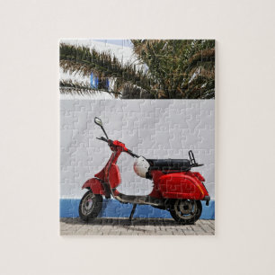 Red motor scooter by wall, Stromboli Island,