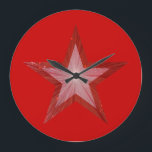 Red Star clock round red Große Wanduhr<br><div class="desc">Modern design with a "shining" red and white star on a red background. Wall clock with a customizable design for you to personalise with your own text, images and ideas. Please note that this is a printed image created using original photographs and digital techniques, it does not shine or contain...</div>
