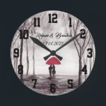 Red umbrella Love couple rustic romantic Wedding R Runde Wanduhr<br><div class="desc">Red umbrella watercolour painting. Love couple with red umbrella. Beautifully hand painted artwork by myself. Perfect for newlyweds,  couple.  Wedding anniversary gift. Valentine’s Day present. You can customize it with your names and date.</div>