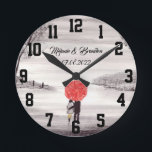 Red umbrella Love couple rustic romantic Wedding R Runde Wanduhr<br><div class="desc">Red umbrella watercolour painting. Love couple with red umbrella. Beautifully hand painted artwork by myself. Perfect for newlyweds,  couple.  Wedding anniversary gift. Valentine’s Day present. You can customize it with your names and date.</div>