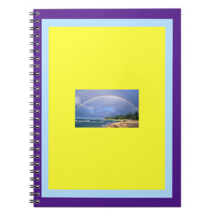 Regenbogen auf einem Spiral-Foto-Album-Notebook Notizblock