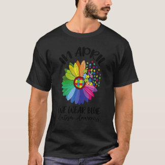 Regenbogen-Gänseblümchen-Puzzle Im April tragen wi T-Shirt