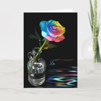 Regenbogen-Rose mit Wasserreflexion