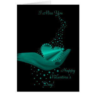 Regenbogenherz in Hand mit Sternen