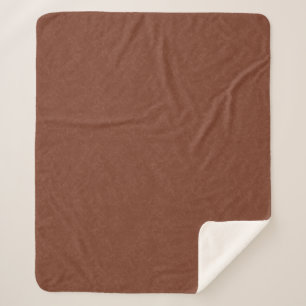 Reiches braunes wirbelndes Muster mit Textur Sherpadecke