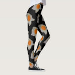 Reifeneier-Muster auf Schwarz Leggings<br><div class="desc">Starten Sie ein Gespräch, wenn Sie diese tragen. Wenn Sie nach einem Blickfang suchen, zeigen Sie, stoppen, Menschenmenge gefallen Paar Leggings, hier sind sie. Egal, aus welchem Grund Sie gewollt haben, ein Gespräch in Gang zu setzen, diese werden Sie auf Ihrem Weg gut machen. Ein gebratenes Ei auf schwarzem Hintergrund....</div>