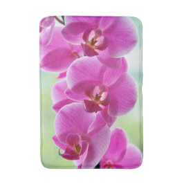 Reizende rosa Orchideen Badematte