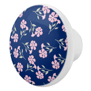 Reizvolles rosa Blumenmuster auf Navyblau Keramikknauf