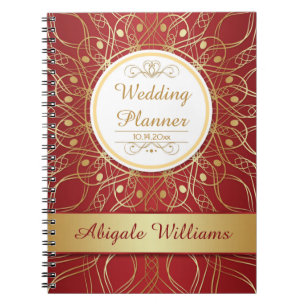 Remous d'or sur le carnet rouge de wedding planner