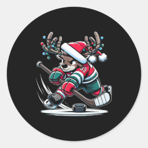 Rentier-Hockeyspieler Slapshot-Hirsch in festliche Runder Aufkleber