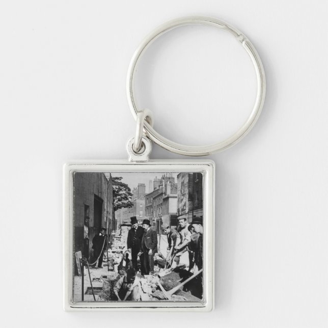 Reparieren eines Rohres Schlüsselanhänger (Vorne)