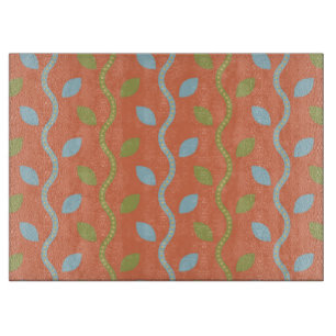 Retro Blue & Green Vines auf orangefarbenem Muster Schneidebrett