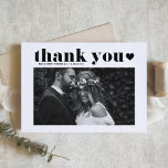 Retro Bold Typografy Black Heart Foto Wedding Dankeskarte<br><div class="desc">Senden Sie herzliche Anerkennung mit unserer personalisierbaren Foto Hochzeit Dankeschön-Karte, die entworfen wurde, um Retro fett formatiert Typografie mit einem eleganten handgeschriebenen Skript zu verbinden. Diese Karte bietet einen einzigartigen und stilvollen Weg, um den Gästen, die Ihren besonderen Tag feierten, Ihre Dankbarkeit auszusprechen. Die Karte mit Ihrer einzigartigen Danksagung einfach...</div>