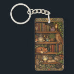 Retro book lover woodland animals schlüsselanhänger<br><div class="desc">A cozy retro-inspired design featuring a charming bookshelf filled with vintage books,  delicate botanical accents,  cute woodland animals and a comforting cup of tea or coffee.</div>