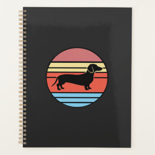 Retro-Dachshund-Sonnenuntergangs-Vektor Planer