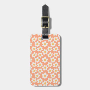 Retro-Daisy-Blüten auf orangefarbenem Hintergrund Gepäckanhänger