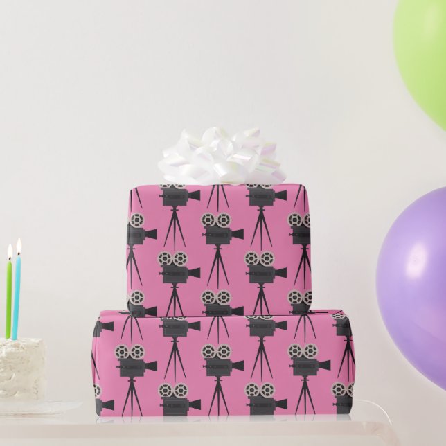 Retro-Filmkameras auf rosa Geschenkpapier (Partygeschenke)