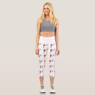 Retro-Fußballspieler, der einen Ball volley kickt Capri Leggings