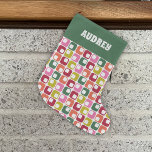 Retro Geometric Print 1970s Personalized Großer Weihnachtsstrumpf<br><div class="desc">Add some joy to your Christmas gifts with this patterned stocking featuring a simple geometric pattern in a retro 1970s color palette of red,  lime green,  orange,  pink and green against a white background. Your name appears at the top in retro style white lettering against a green background.</div>