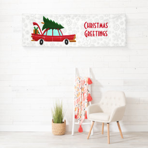 Retro Red Car mit einem Weihnachtsbaum Banner