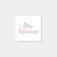 Retro rotes Auto mit einem Weihnachtsbaum