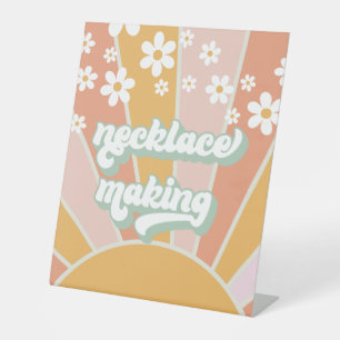 Retro-Sonnenlicht Groovy-Halskettenherstellungs-Ak Sockelschild