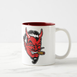 Rétro tasse de café de tête de diable