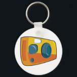 Retro Yellow Point and Shoot Film Camera Schlüsselanhänger<br><div class="desc">Keep your passion for photography close at hand with this retro yellow point and shoot camera keychain. This small but vibrant accessory features a stylized cartoon film camera in bright orange and yellow colors, making it easy to find your keys in any bag. It is a perfect stocking stuffer or...</div>