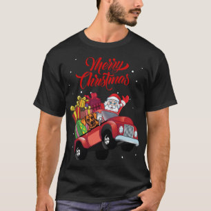 Rhodesian Ridgeback mit dem Weihnachtsmann im rote T-Shirt