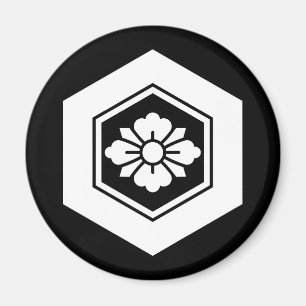 Rhombische Blume mit Schwertern in Tortoiseshell Magnet