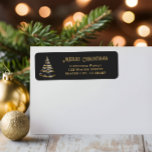 Ribbon Christmas Tree Gold Rücksendeadressen-Aufkl<br><div class="desc">Weihnachtsbaum Imitate Gold und Schwarz // Fügen Sie eine festliche Touch zu Ihrer Mail mit unseren eleganten Ribbon Weihnachtsbaum-Rücksendeadressen-Aufklebern! Mit einem atemberaubenden Imitat aus Gold und Schwarz mit glitzernden Schneeflocken auf schwarzem Hintergrund strahlen diese Labels Eleganz und Charme aus. Der Text "Frohe Weihnachten" in goldenem Beige kann leicht auf "Feiertage...</div>