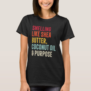 riecht nach Shea-Butter, Kokosöl und Zweck  T-Shirt