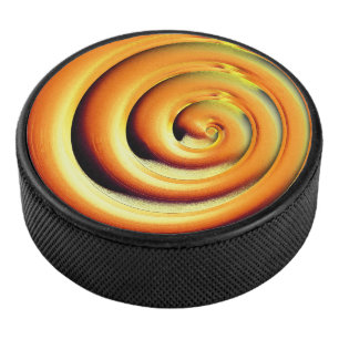 Riesenorange-Spirale in schwarz Eishockey Puck